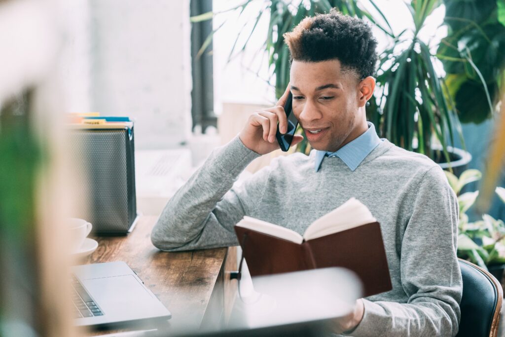 Payroll services Essex | Man on phone