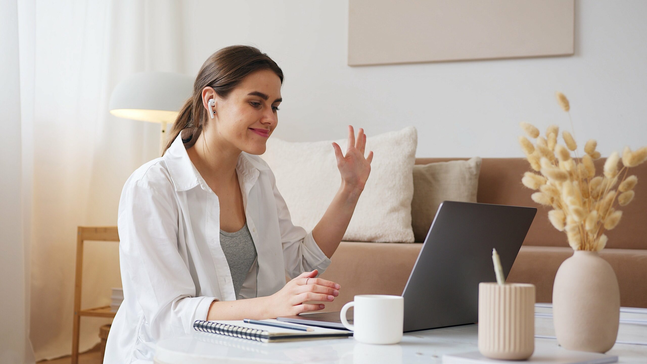 Bookkeeping Services | Woman Looking Happy At Laptop